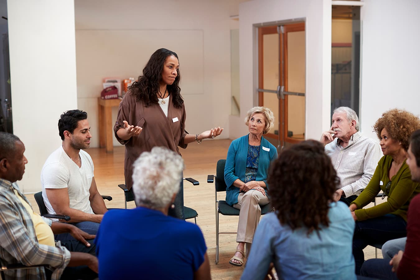 A woman contributing to a group learning session
